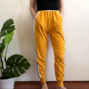 Mustard yellow sweatpants from Nun Bangkok